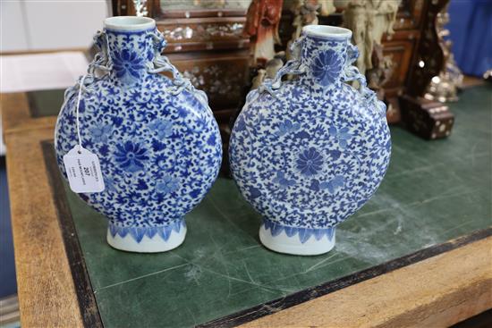 A pair of Chinese blue and white moonflasks, 19th century, H. 25.3cm